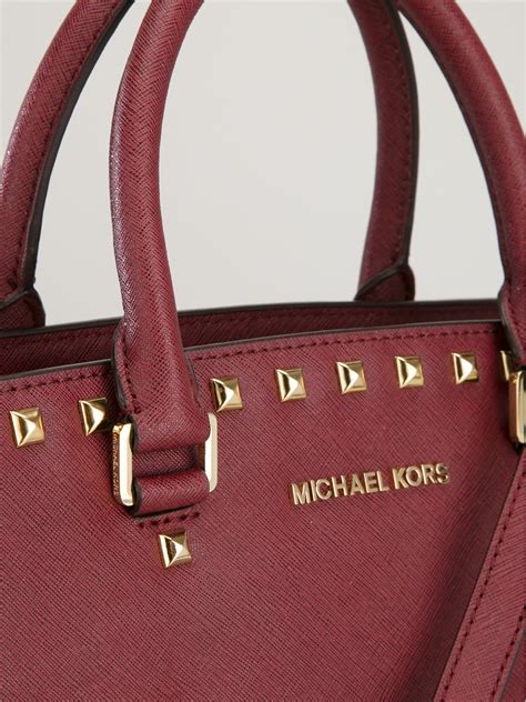 michael kors selma red bag|Michael Kors selma studded.